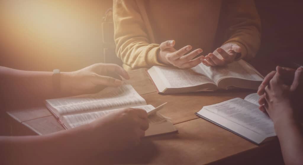 Christian groups open the Bible page and study the Bible with friends. in the Sunday School classroom.